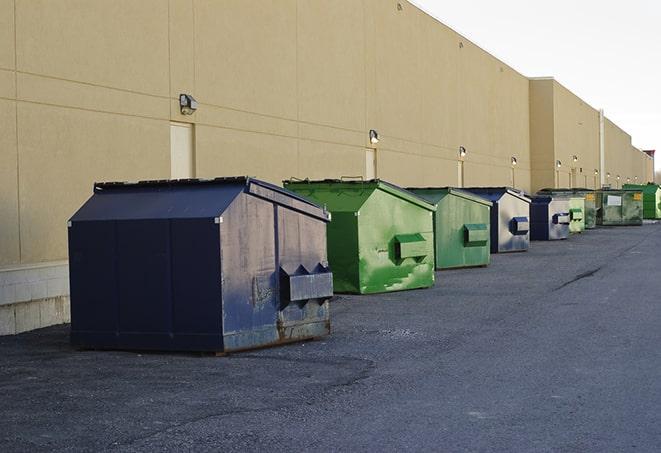 closed construction dumpster with a sign prohibiting unauthorized access in Hayward